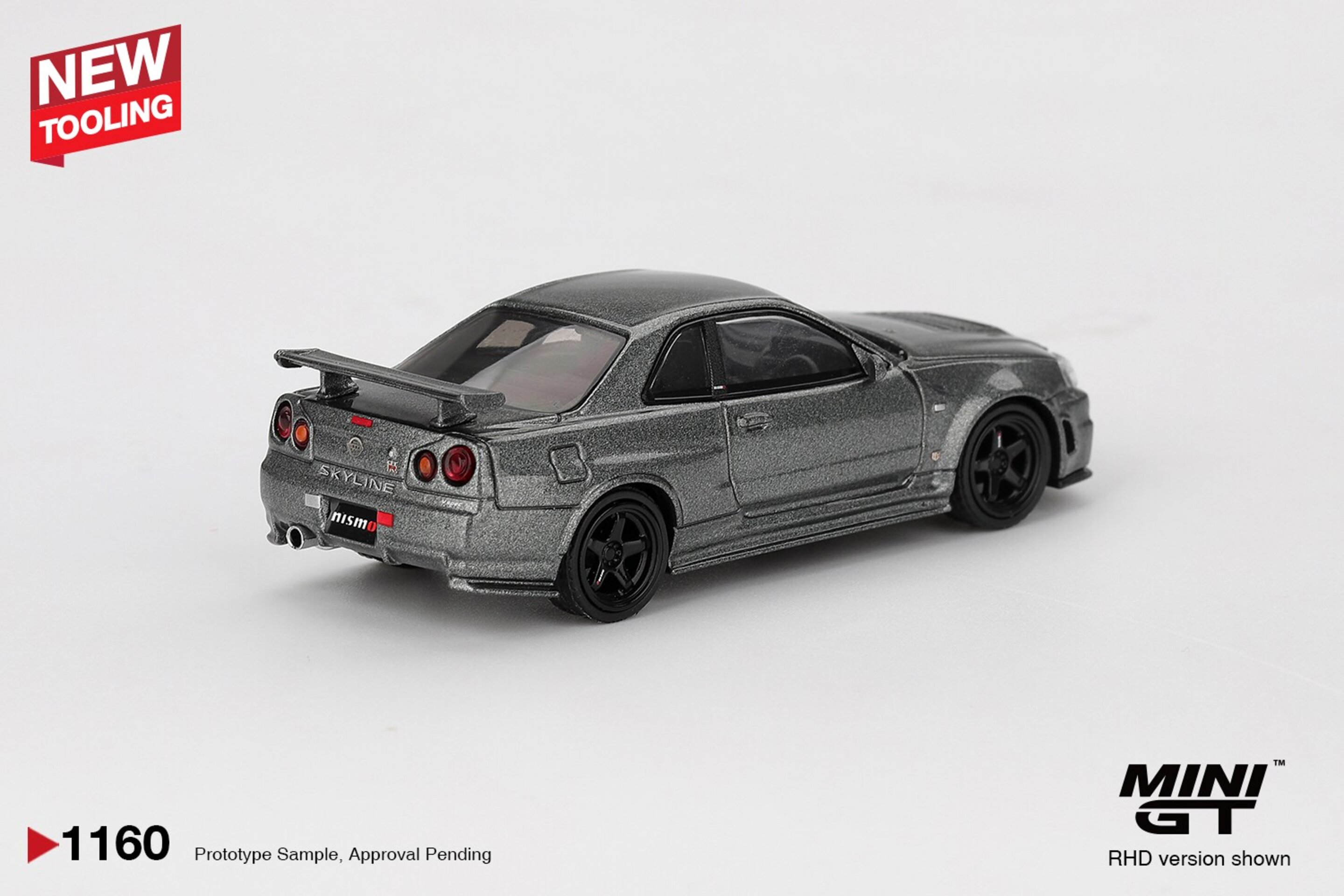 (PRE VENTA) MINI GT 1:64 NISSAN SKYLINE GTR (R34) DARK METAL GRAY NISMO CRS 1999 - 4