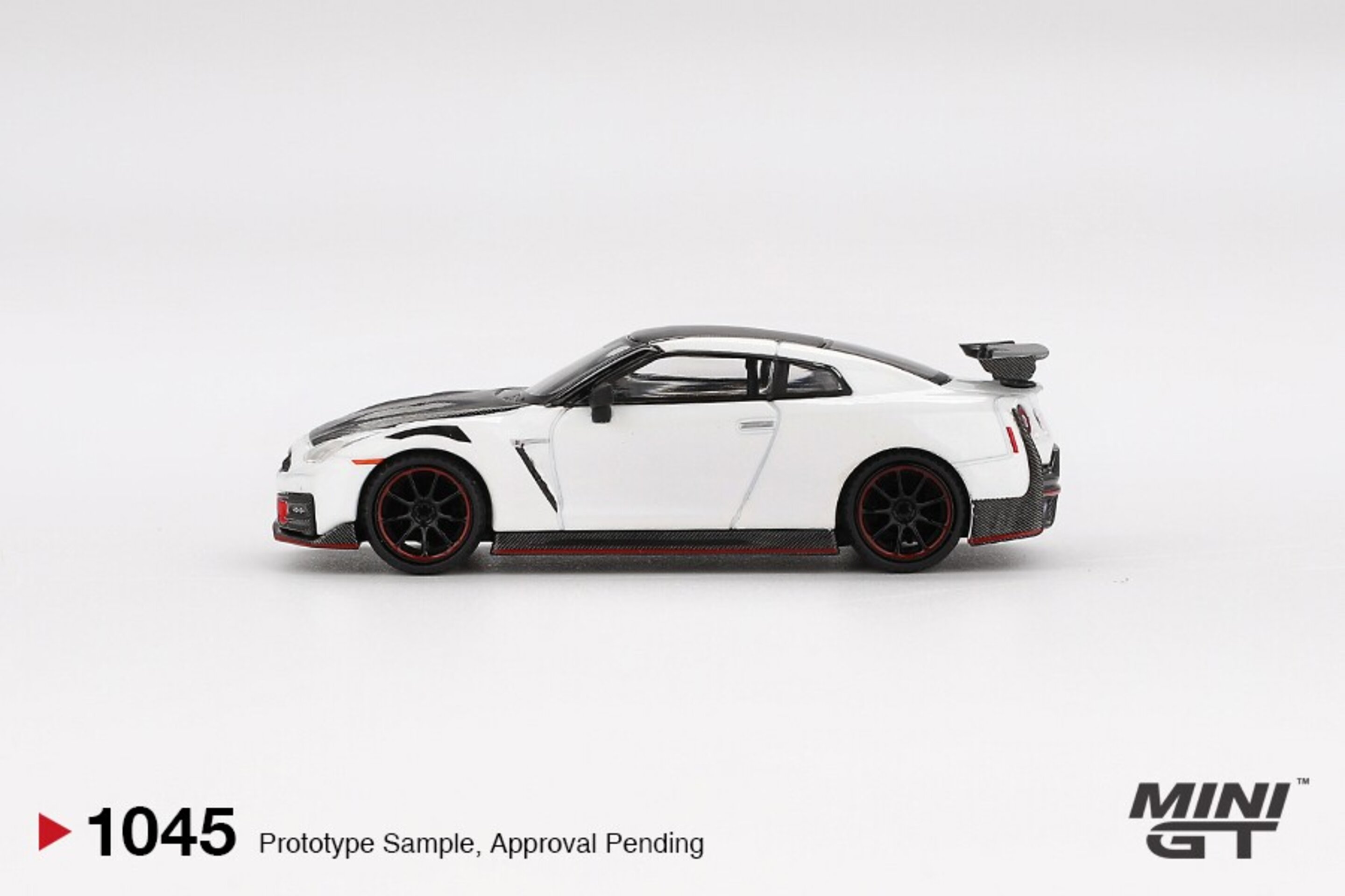 (PRE VENTA) 1:64 NISSAN GTR (35) NISMO  BRILLIANT WHITE PEARL 2024 MINI GT - 4