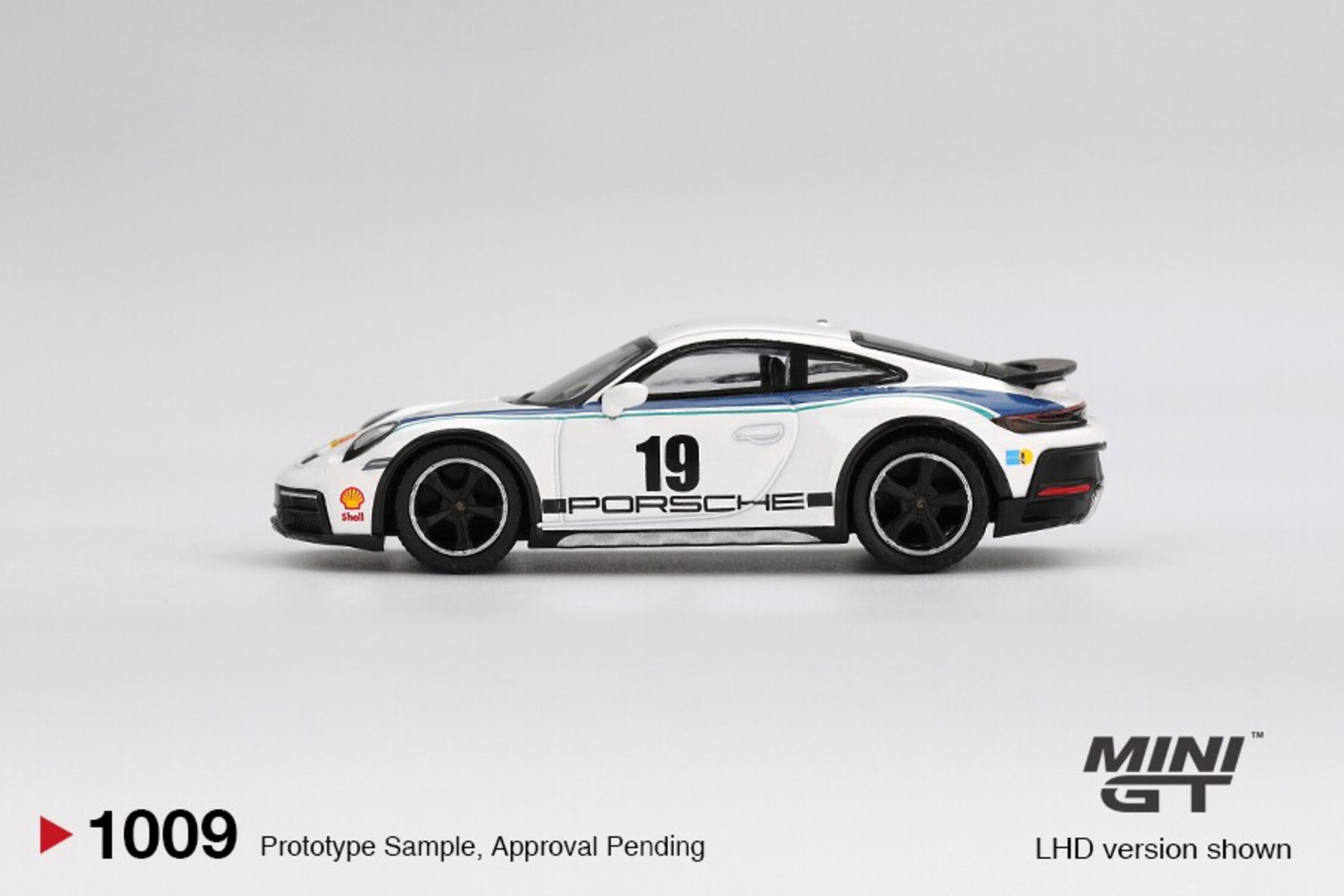 (PRE VENTA) 1:64 PORSCHE 911 (992) DAKAR RALLYE DESIGN PACKAGE 74 2024 - 3