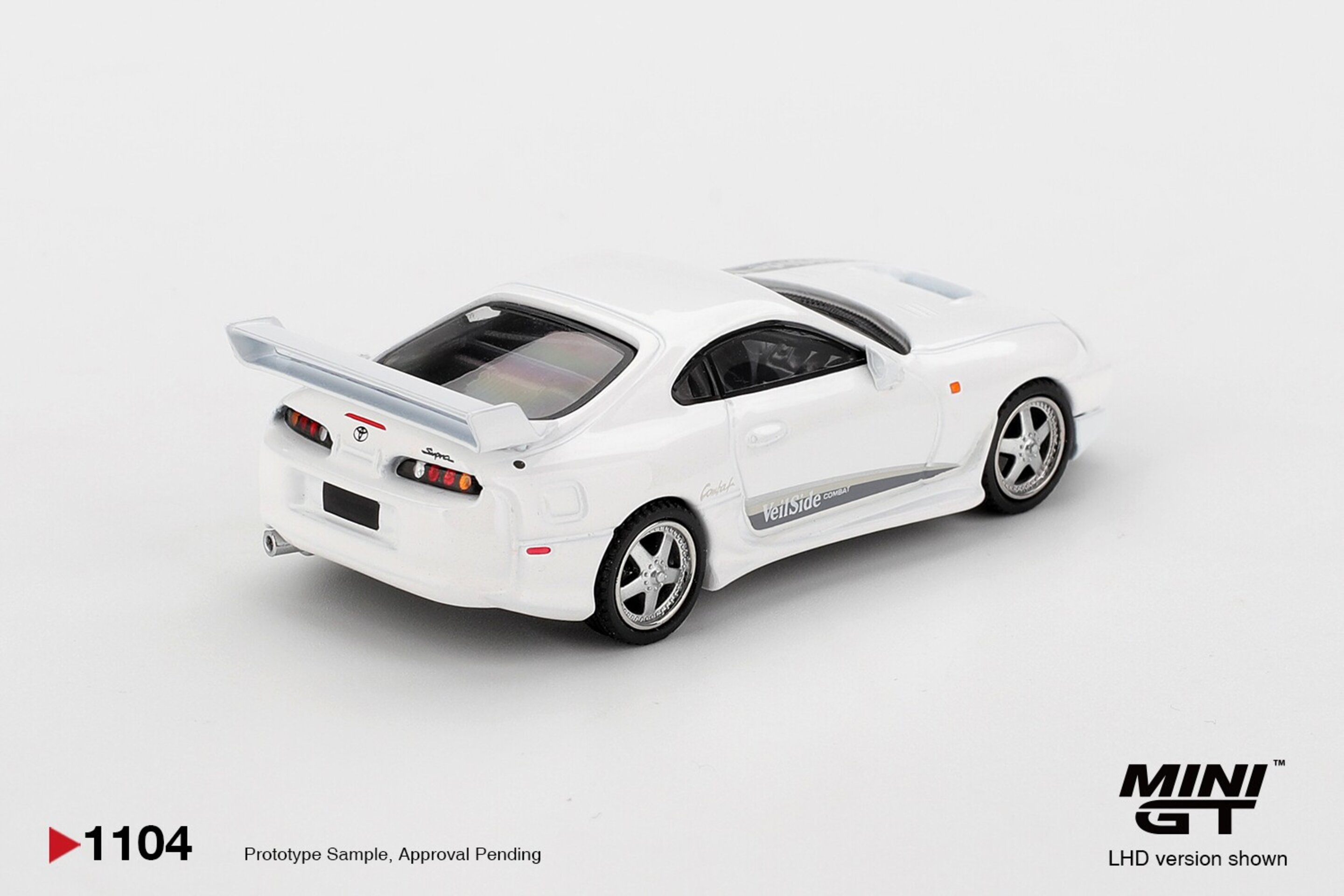 (PRE VENTA) MINI GT 1:64 TOYOTA SUPRA MK4 (A80) VEILSIDE COMBAT V-I WHITE PEARL - 4